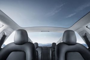 model-3-interior-glass-roof-blue-sky