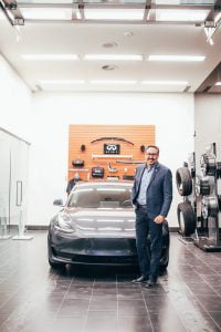 infiniti-dealer-delivers-tesla-model-3-4